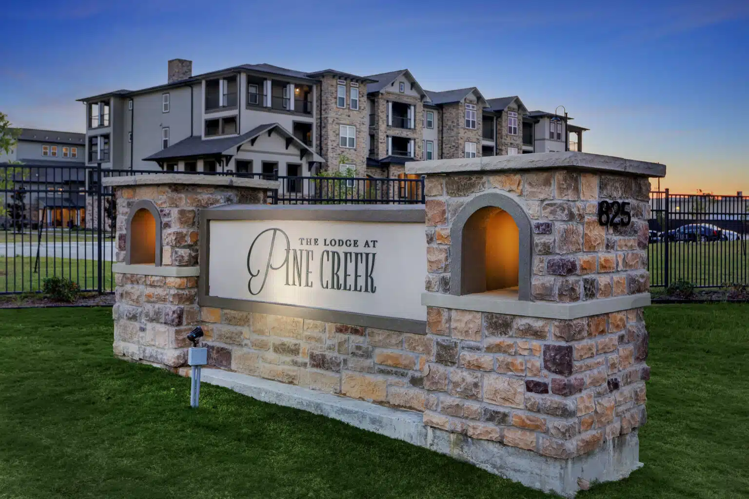 The Lodge at Pine Creek Exteriors - Twightlight - Monument Sign