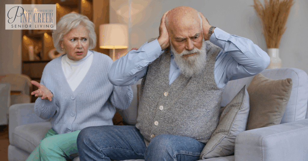 A couple experiencing a moment of frustration as part of the challenges faced by families dealing with dementia care. Effective communication and support are essential in managing the emotional aspects of dementia for the elderly.