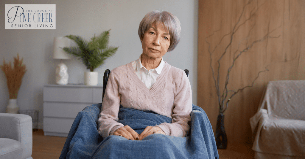 A retired woman with disability sitting in wheelchair. Living with dementia.